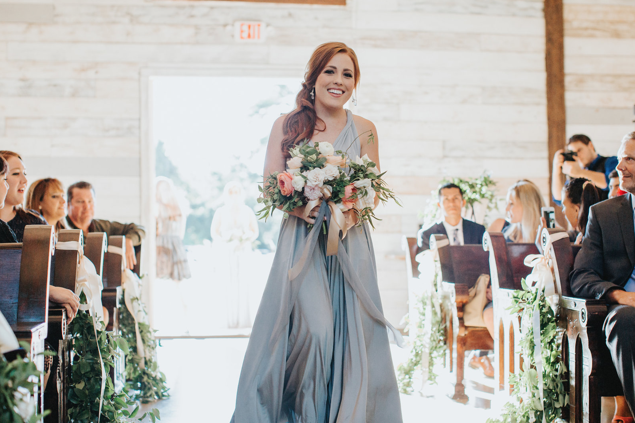 Beautiful bridesmaid with her bouquet by Maxit Flower Design at Big Sky Barn