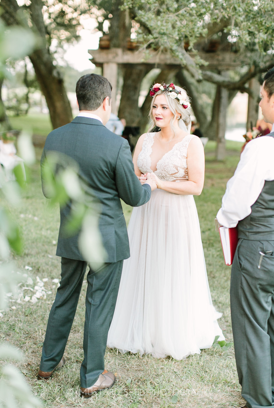 Our sweet couple exchanging vows during the ceremony.