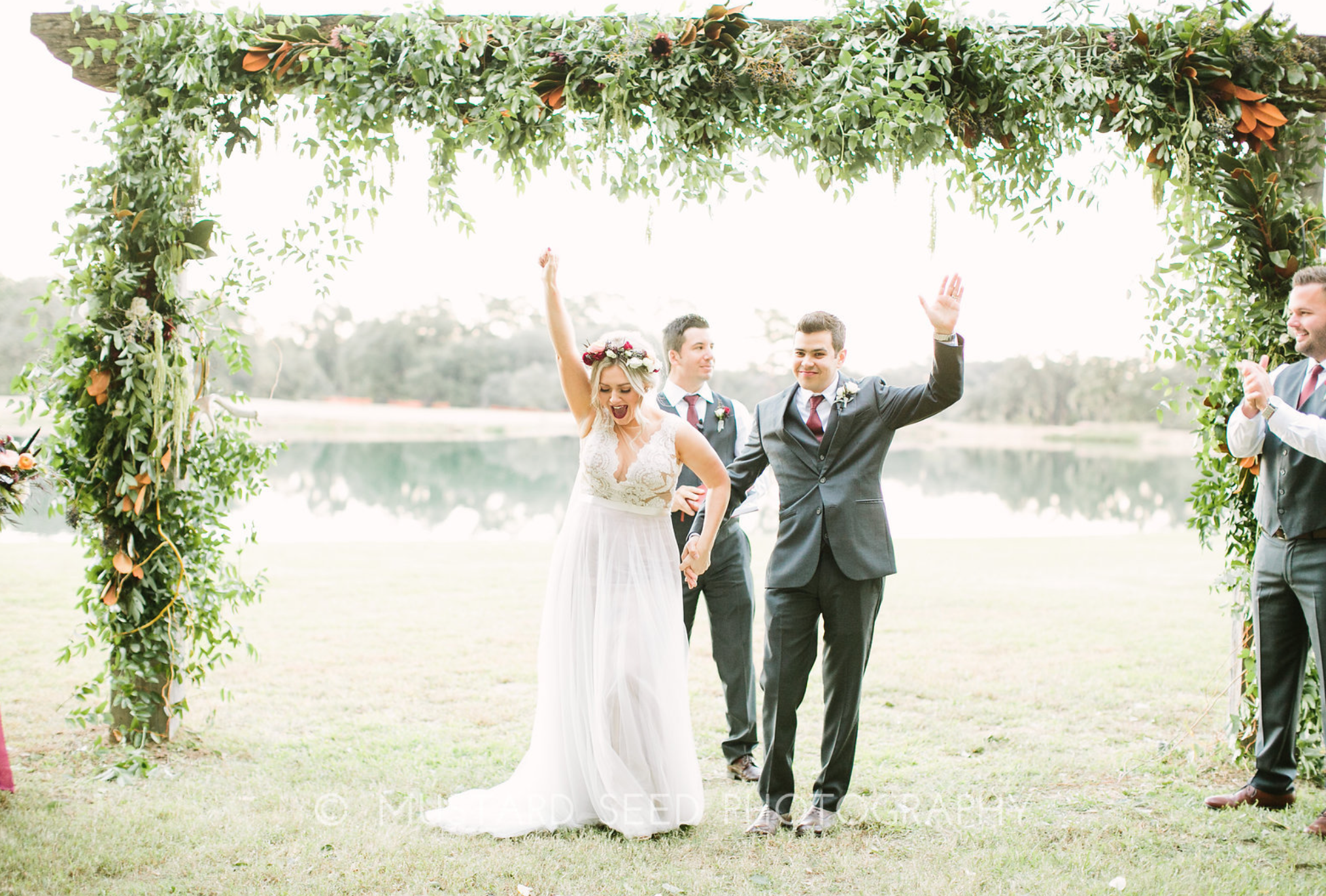 Floral arch by maxit flower design in houston, texas.