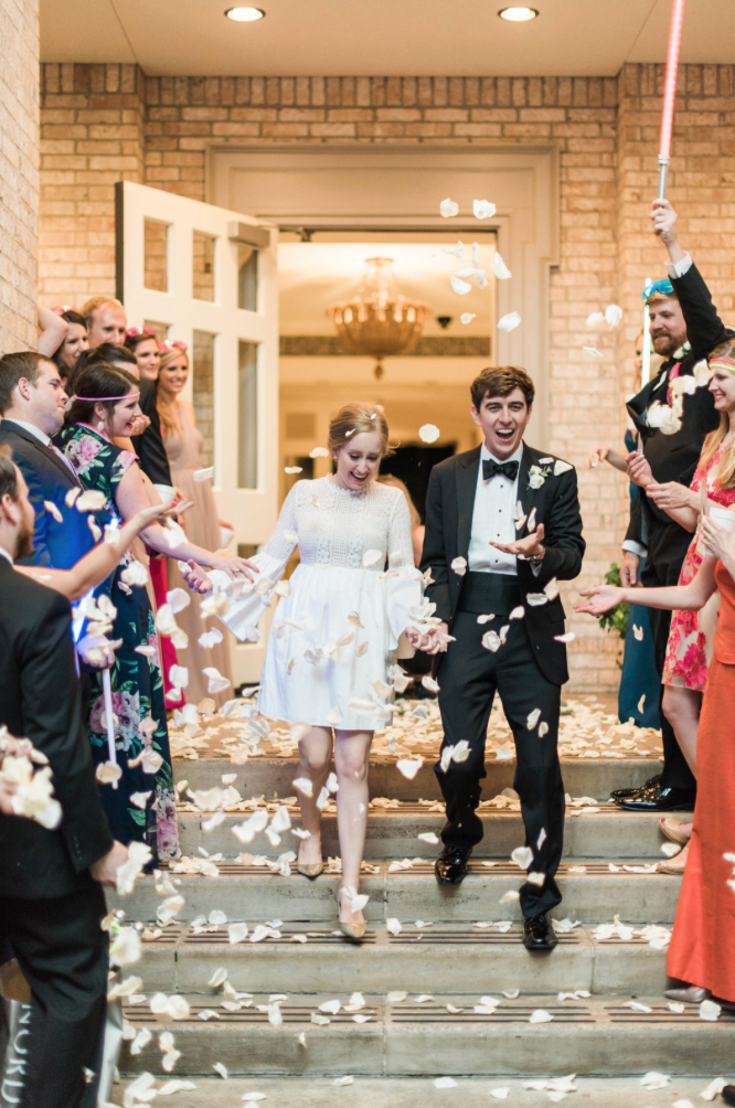 wedding-bride-groom-reception-exit-photography-dana-fernadez-river-oaks-country-club-rose-petals-floral-greenery-by-maxit-flower-design-houston-texas