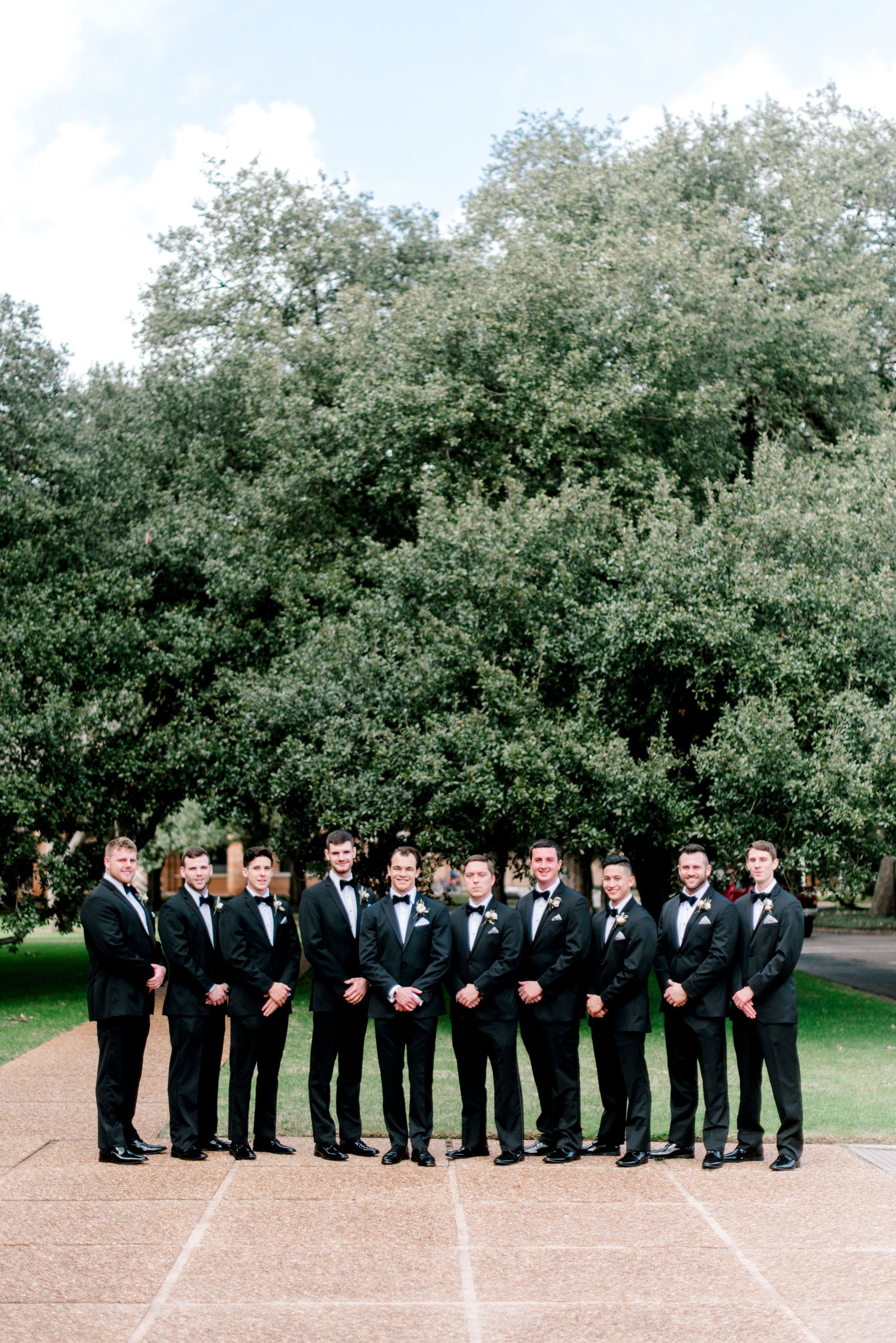 wedding-details-photography-dana-fernandez-groom-groomsmen-tux-bowtie-boutonniere-floral-greenery-by-maxit-flower-design-houston-texas