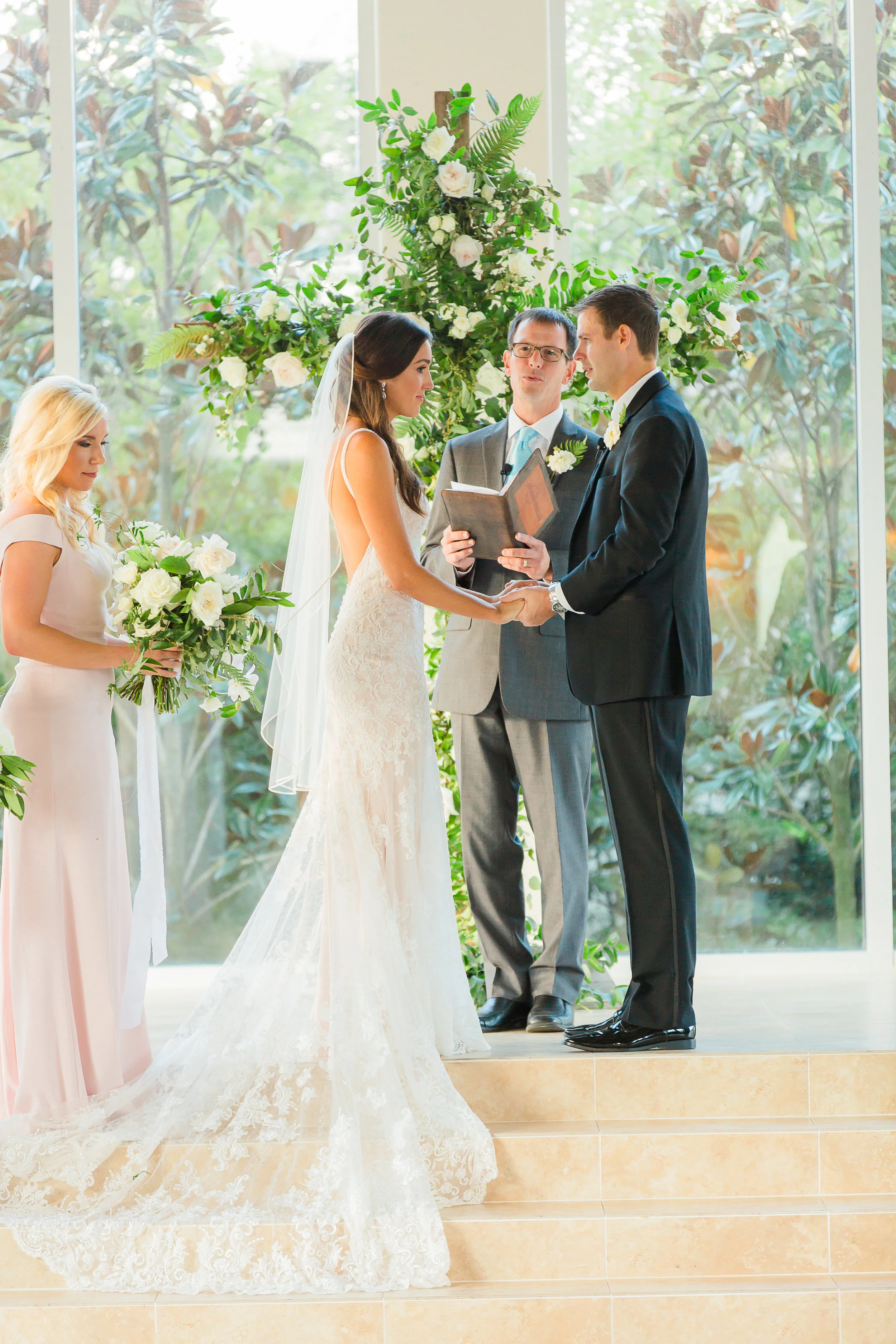 Ceremony-Cross-Bridesmaids-Bride-Groom-Pastor.jpg