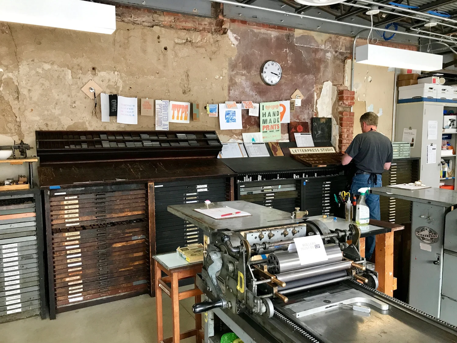 Letterpress machines at the entrance of a print shop
