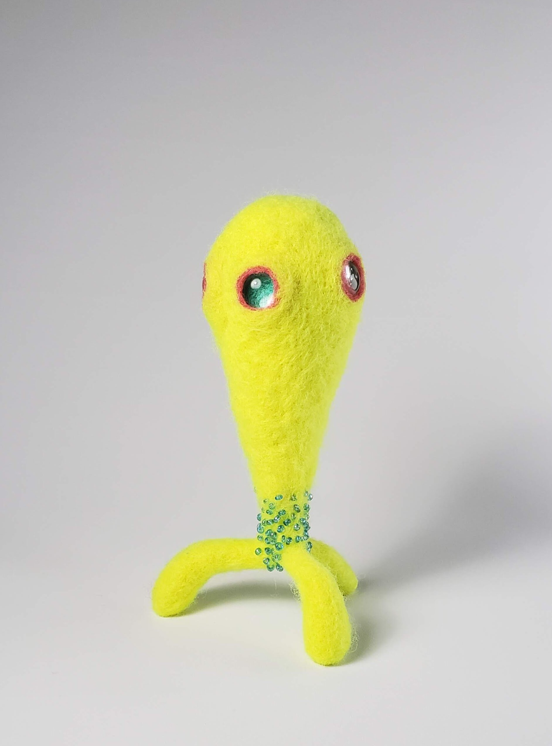 Small Yellow Alien, Blue Beads