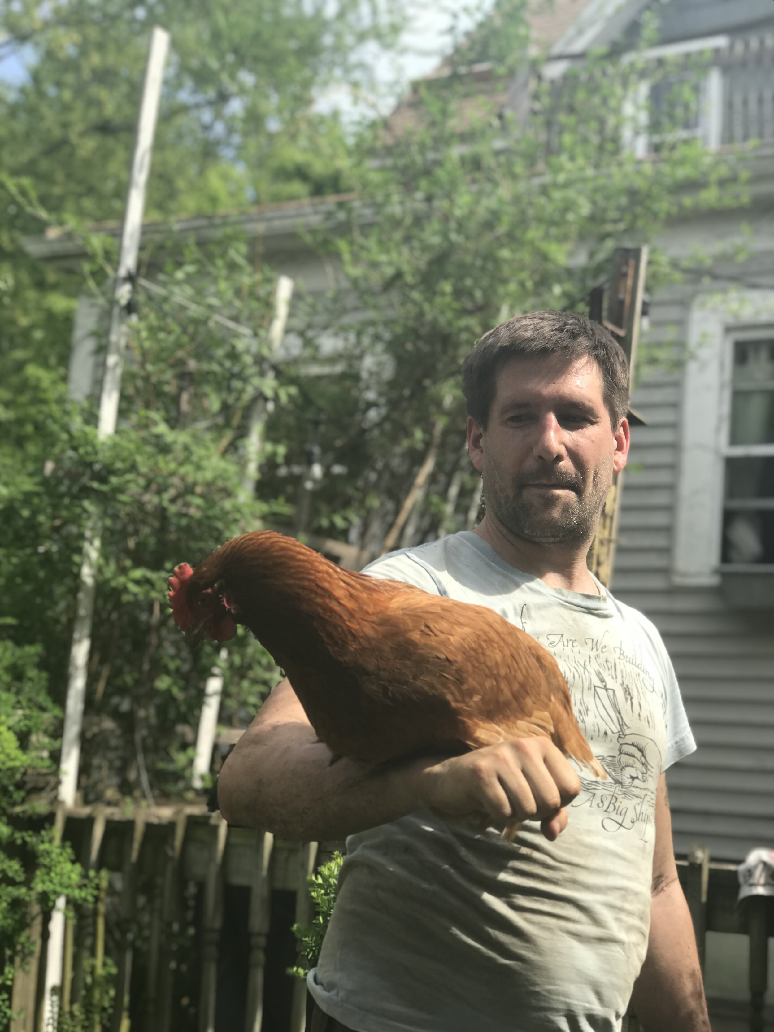  Seriously: how handsome is this man with a chicken? 