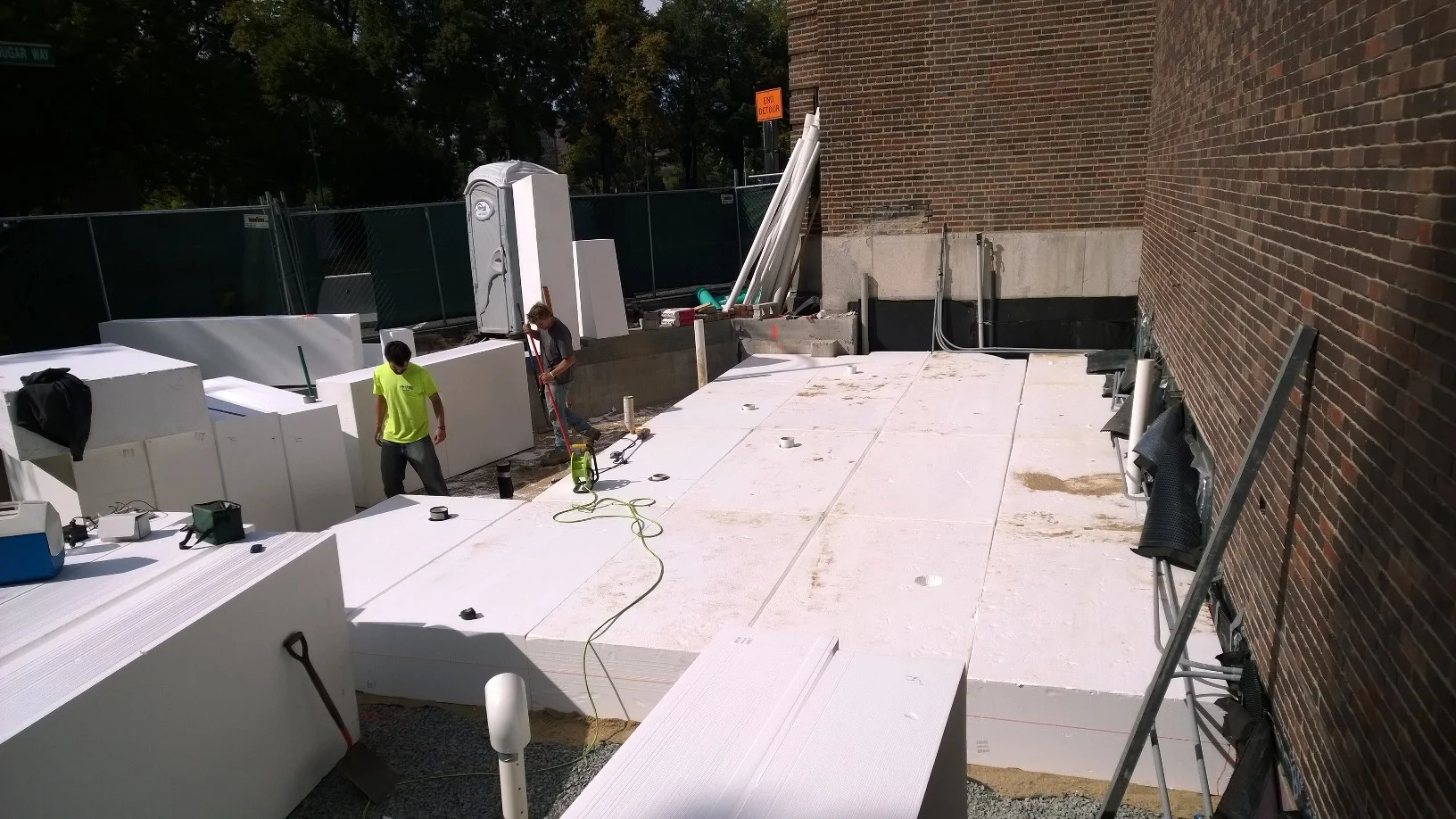 Geofoam base installation. Geofoam, also known as Rigid, Cellular Polystyrene Geofoam, is a lightweight fill option that offers strengths similar to concrete with very low density. Bringing the site up to grade, the weight of traditional earth materials would have greatly increased the risk of immediate settling, making geofoam a great option for this project. 