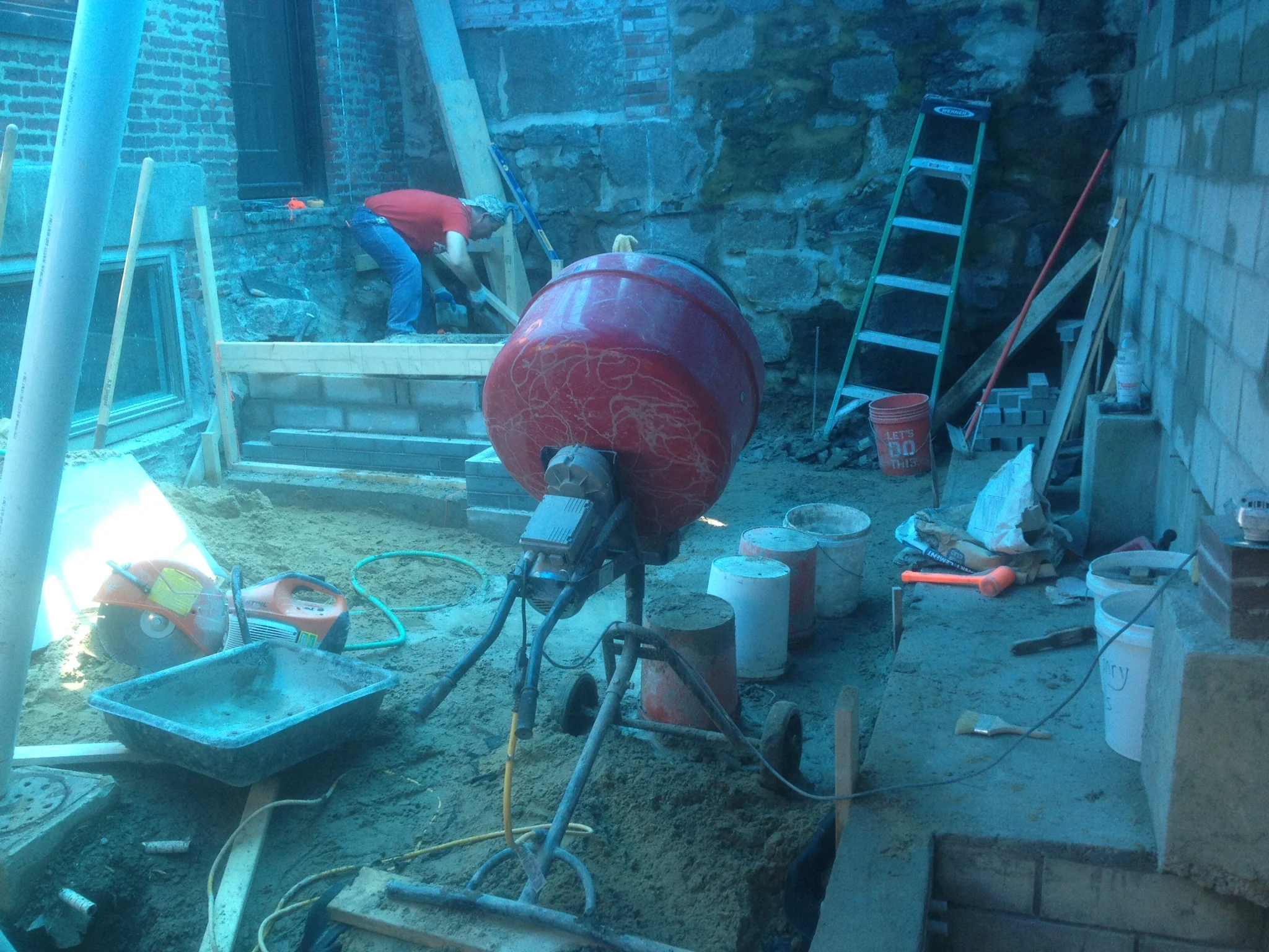 Construction began on the new rear stairs as well as reinforcing a neighboring brick wall. 