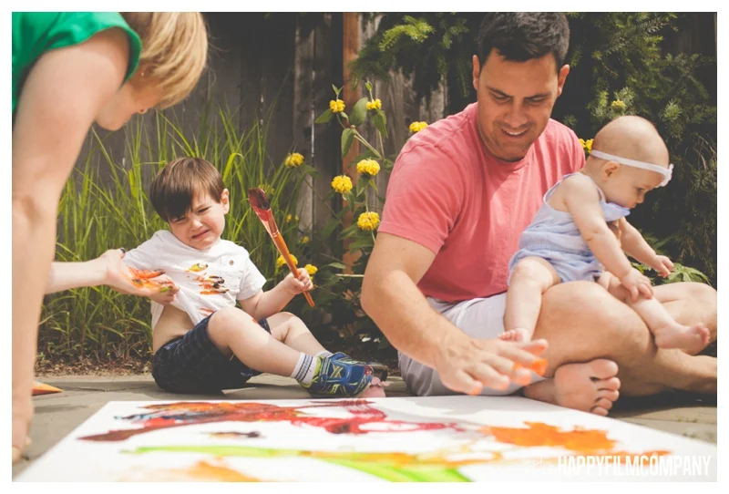 family finger painting photo shoot - the Happy Film Company - Seattle Family Photographer