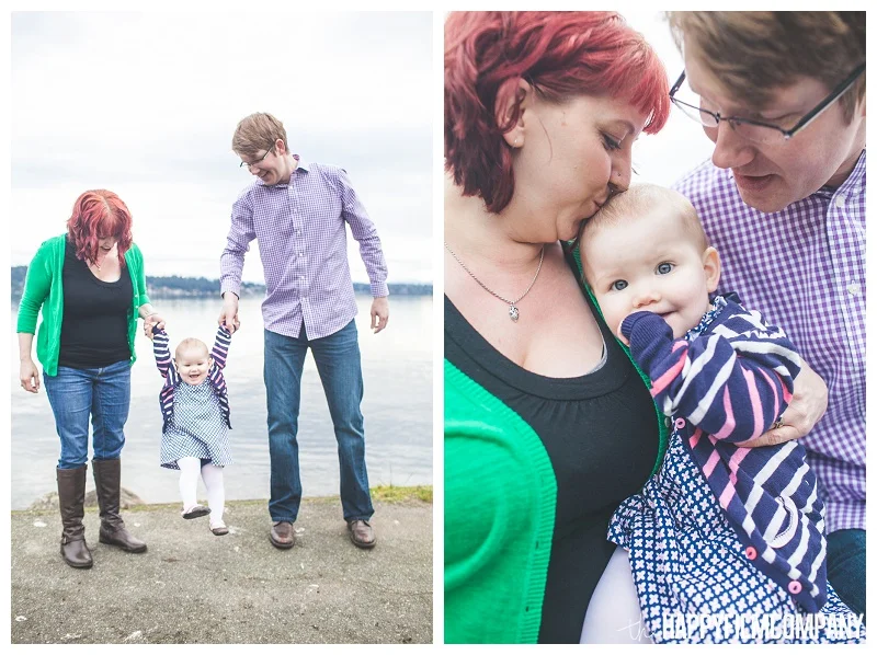 holding baby in the air and cuddling with parents at matthews beach - the Happy Film Company - Seattle PEPS Group Photo Shoot