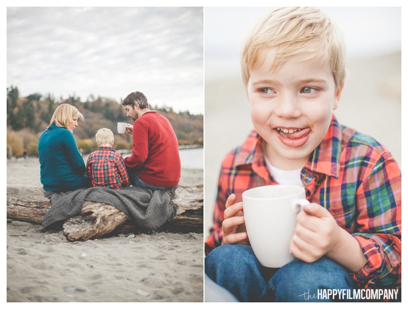 Family of three - At the beach - sitting on drift wood - boy drinking hot chocolate - the Happy Film Company - Seattle Family Photos