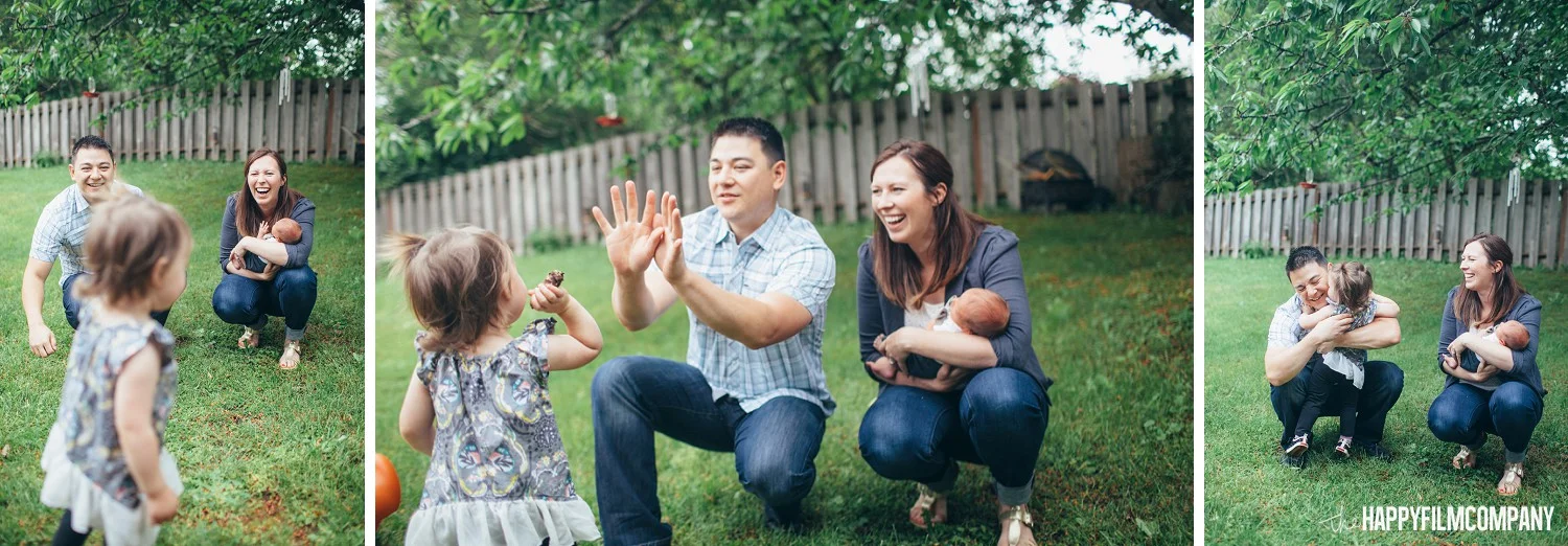 Mom and dad playing with their eldest child - the Happy Film Company - Seattle Family Photos