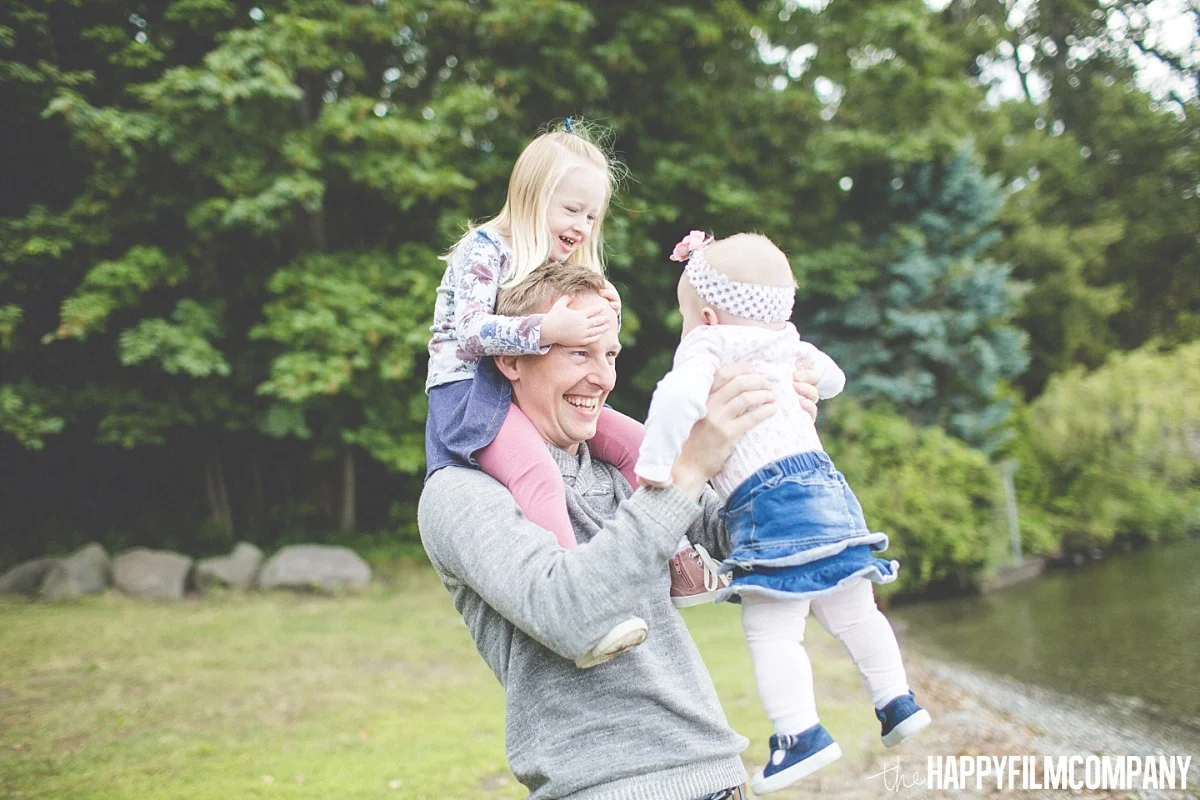 Dad carrying her two little girls - the Happy Film Company - Seattle Family Photos