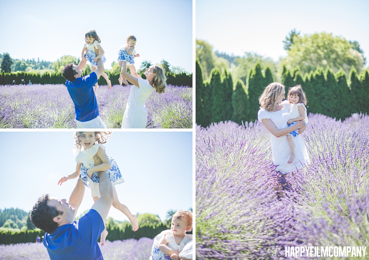 Mom and Dad lifting kids in the Lavender fields - the Happy Film Company - Seattle Mini Family Photo Shoots