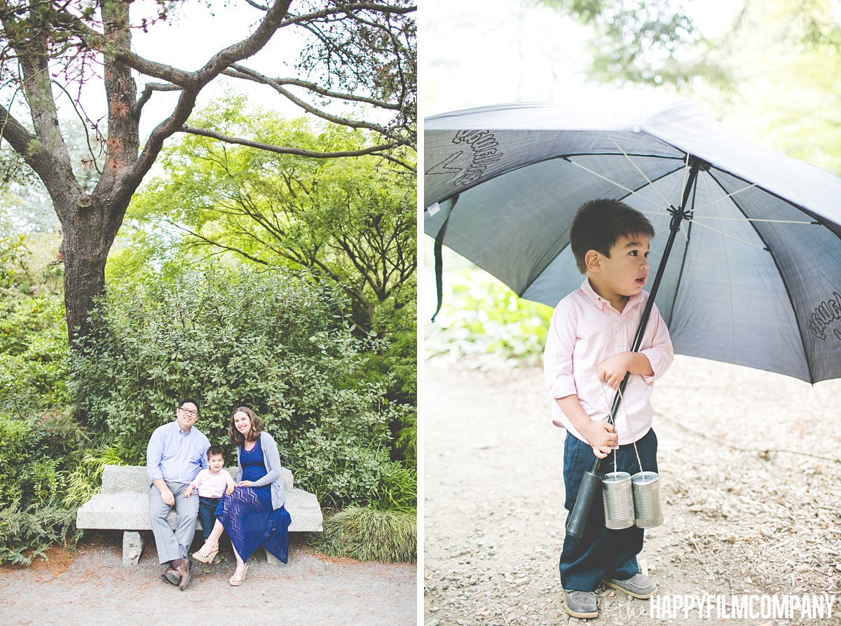 Family portrait in the forest - Little boy holding a big grey umbrella - the Happy Film Company- Seattle Family Photos