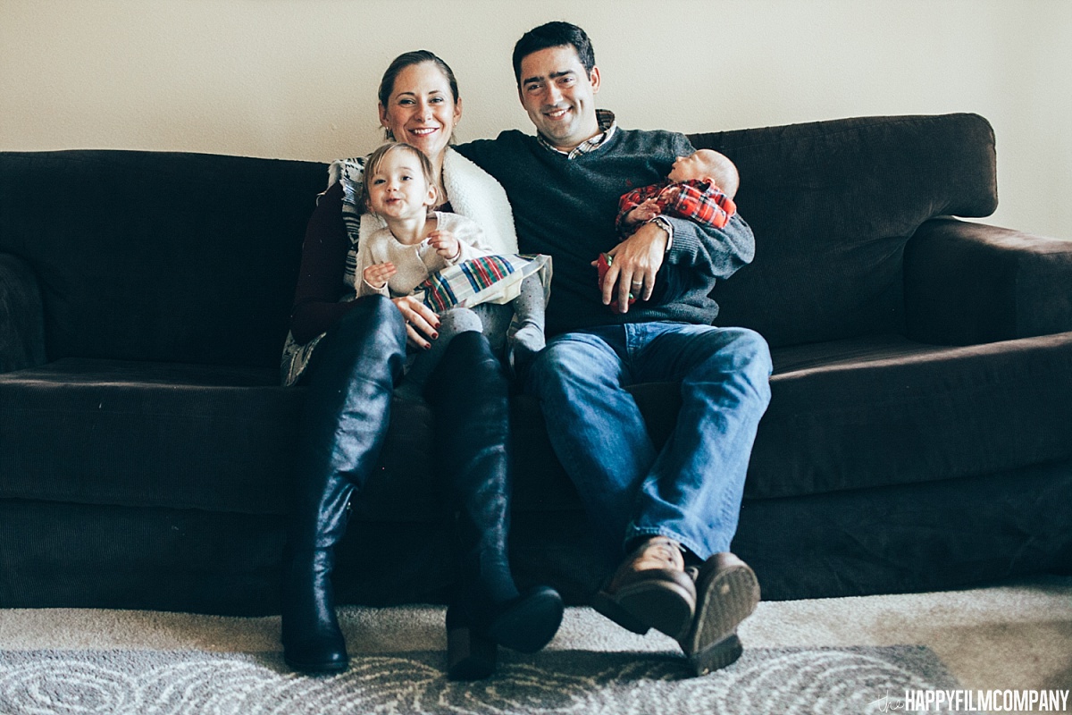 Family of four in the couch - Happy Film Company - Seattle Family Photos
