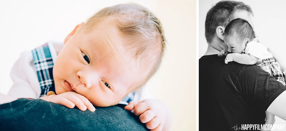 Newborn baby on dady's shoulder - the Happy Film Company - Seattle Family Photos