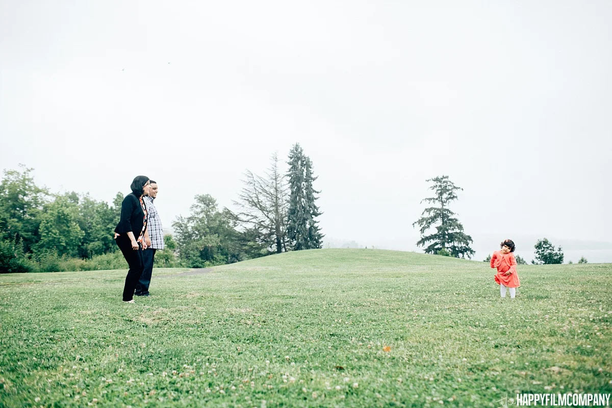 Mother and daughter playing in the green - the Happy Film Company - Seattle Family Photos
