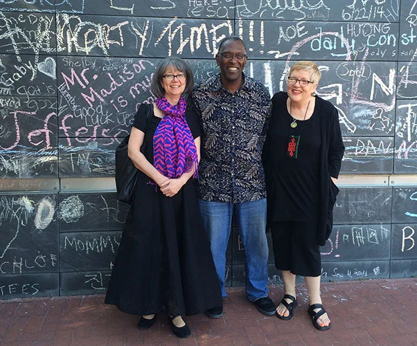 Monica Snellings, John Hunter and DK Holland in front of the Wall of Free Speech in Charlottesville, VA in May