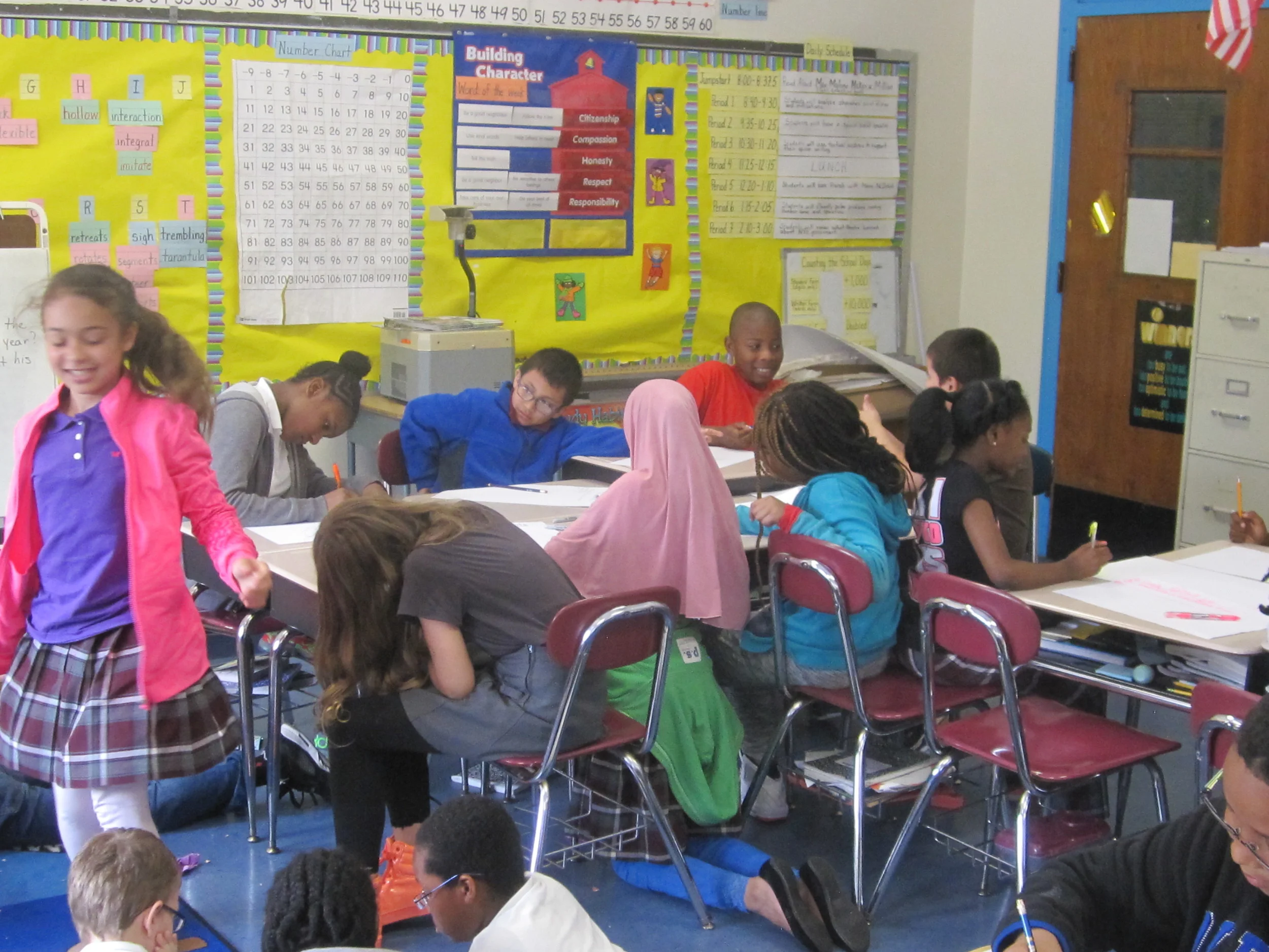 Notice the display on the wall in this photo? Teachers need a huge amount of display space in the classroom but usually they are hard surfaces, like this one, that sound bounces off of.