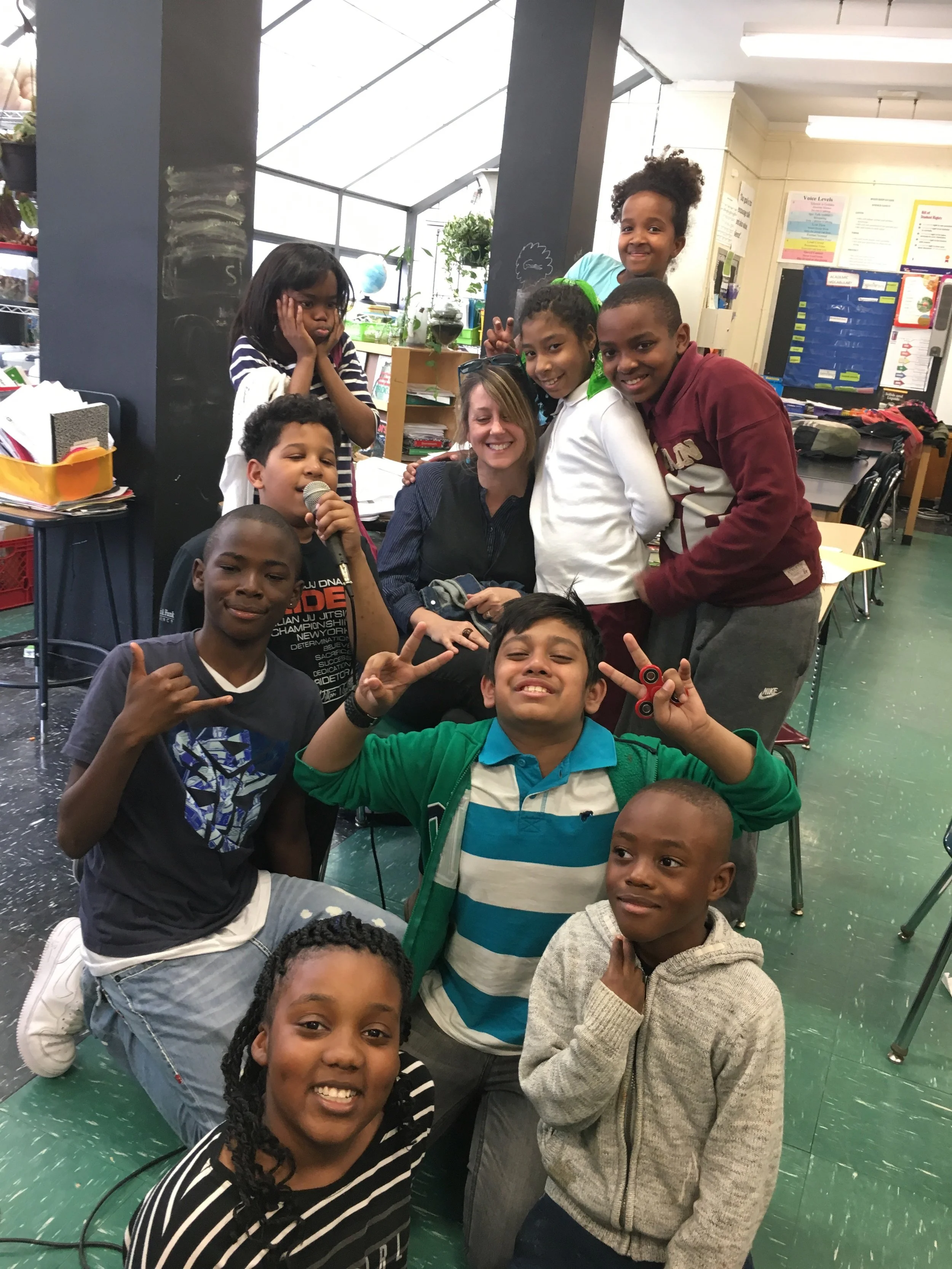 KIds' Council is conducted during soft learning time - after school - were children can run the meetings with a facilitator. Pictured here is Dr. Rebecca Wiseheart whose research focus is on children with special needs and who was their guest at a meeting.
