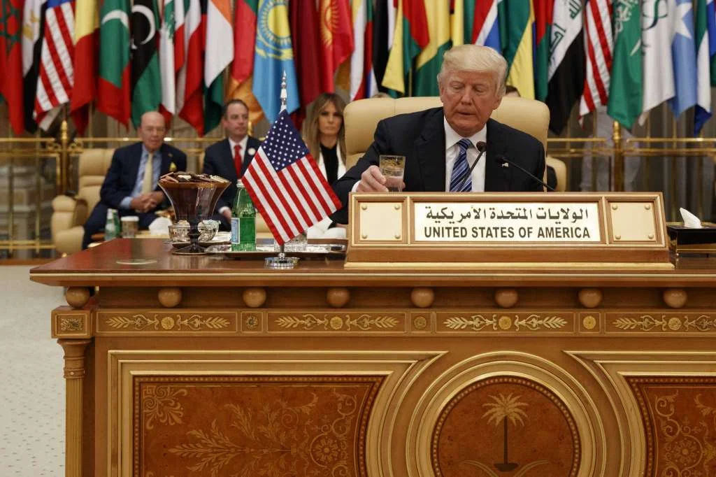 President Donald Trump takes a drink of water before delivering a speech to the Arab Islamic Photo: Evan Vucci, AP