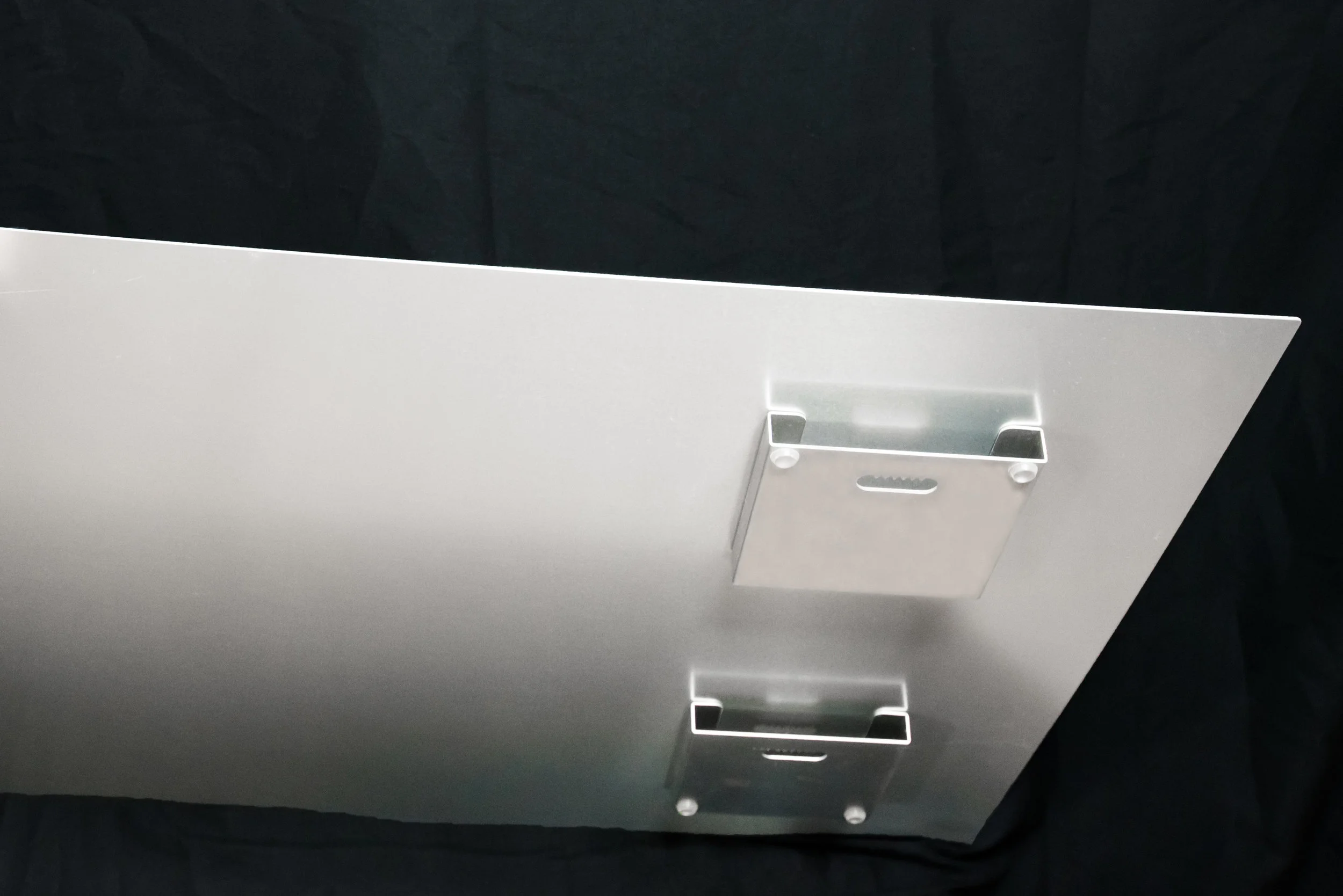 Brushed Aluminum back. They are all ready to just hang on the wall. Lightweight 1/8" Brushed aluminum. With Photo mounted on the front. The metal prints have a shiny coating, and really make the photo pop. 