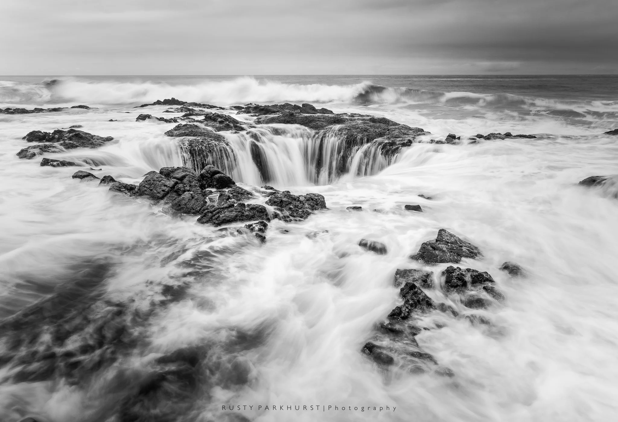 Thor's Well - taken May 19, 2015. This is an amazing sight to see, located along the coast to the south of Yachats, Oregon. The waves move in and out, filling the subsurface tunnel to this blowhole, that seems to be a natural drain for the sea. Just be careful to not get too close!