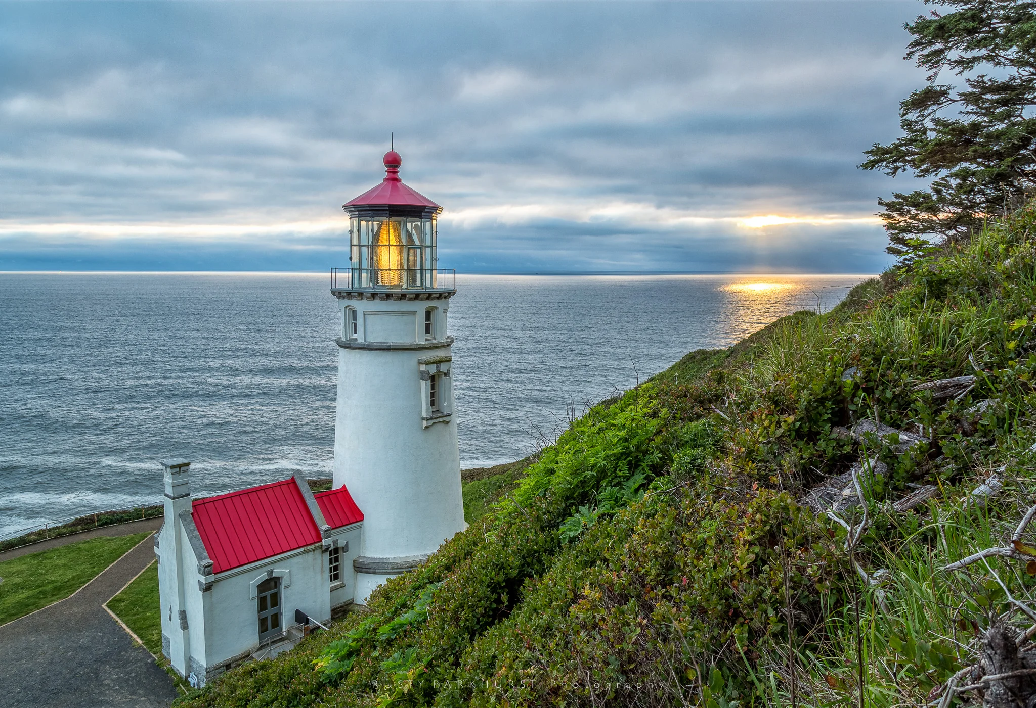 Heceta Head Lighthouse - taken May 19, 2015, at the end of one of my favorite days on the Oregon trip. This is one of those lighthouses that has been photographed millions of times, from every angle imaginable. I still like this image, and the sunbeams in the background really complete it. 
