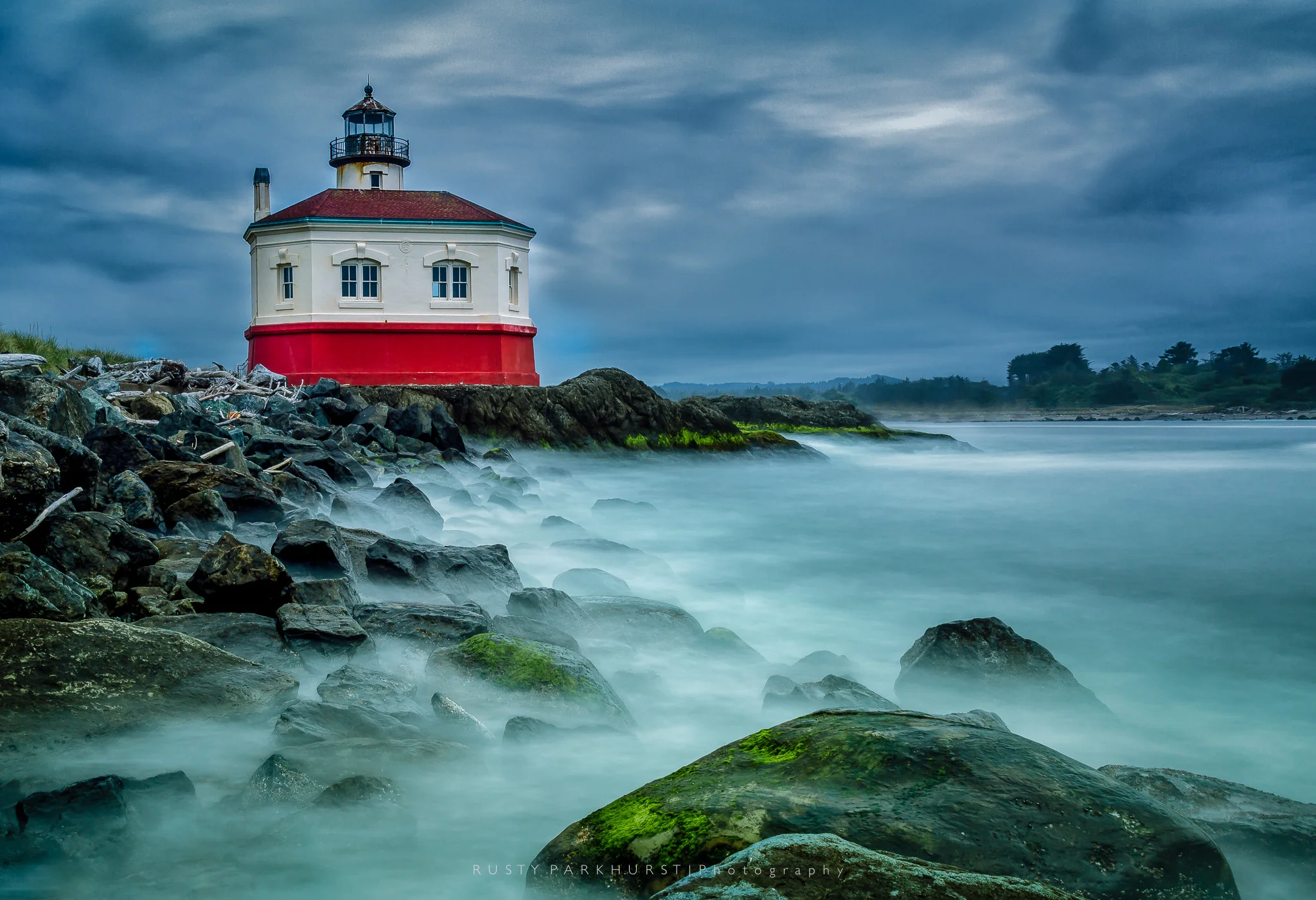 Coquille River Light - taken May 21, 2015. This was a gray, overcast day. The wind was blowing pretty steadily, splashing waves from the Coquille River against the rocky shore. To create something a little different, I used a 10-stop graduated filter to achieve a 30 second exposure and transform the waves into mist. 