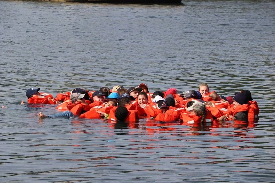 The crew of the Logos Hope taking part in training