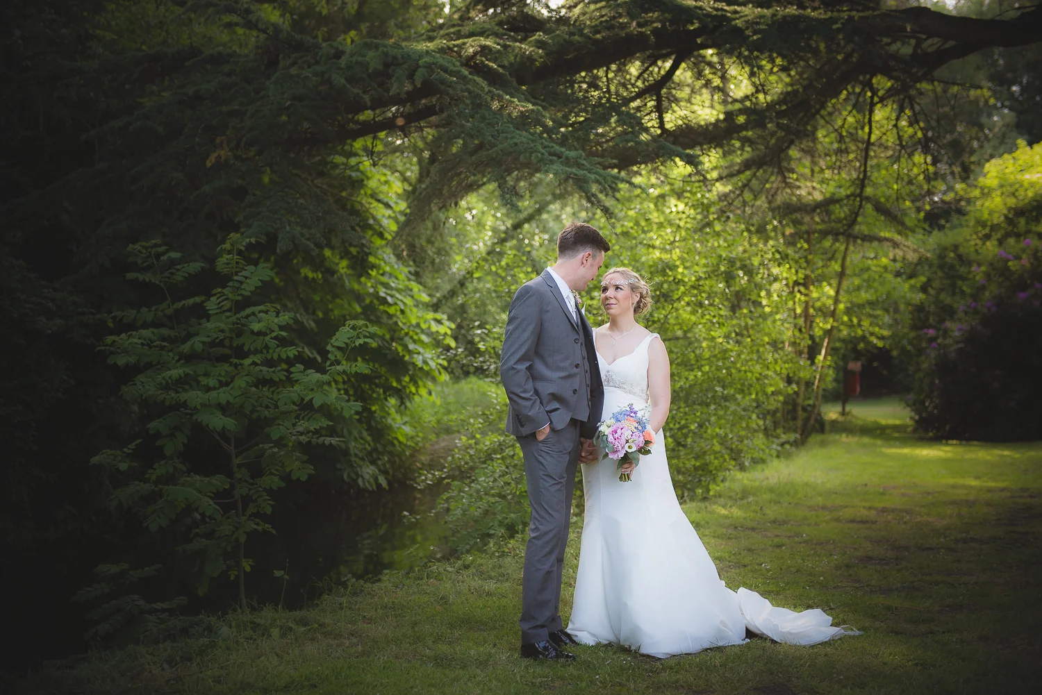 romantic photo of bride and groom after outdoor ceremony in wiltshire