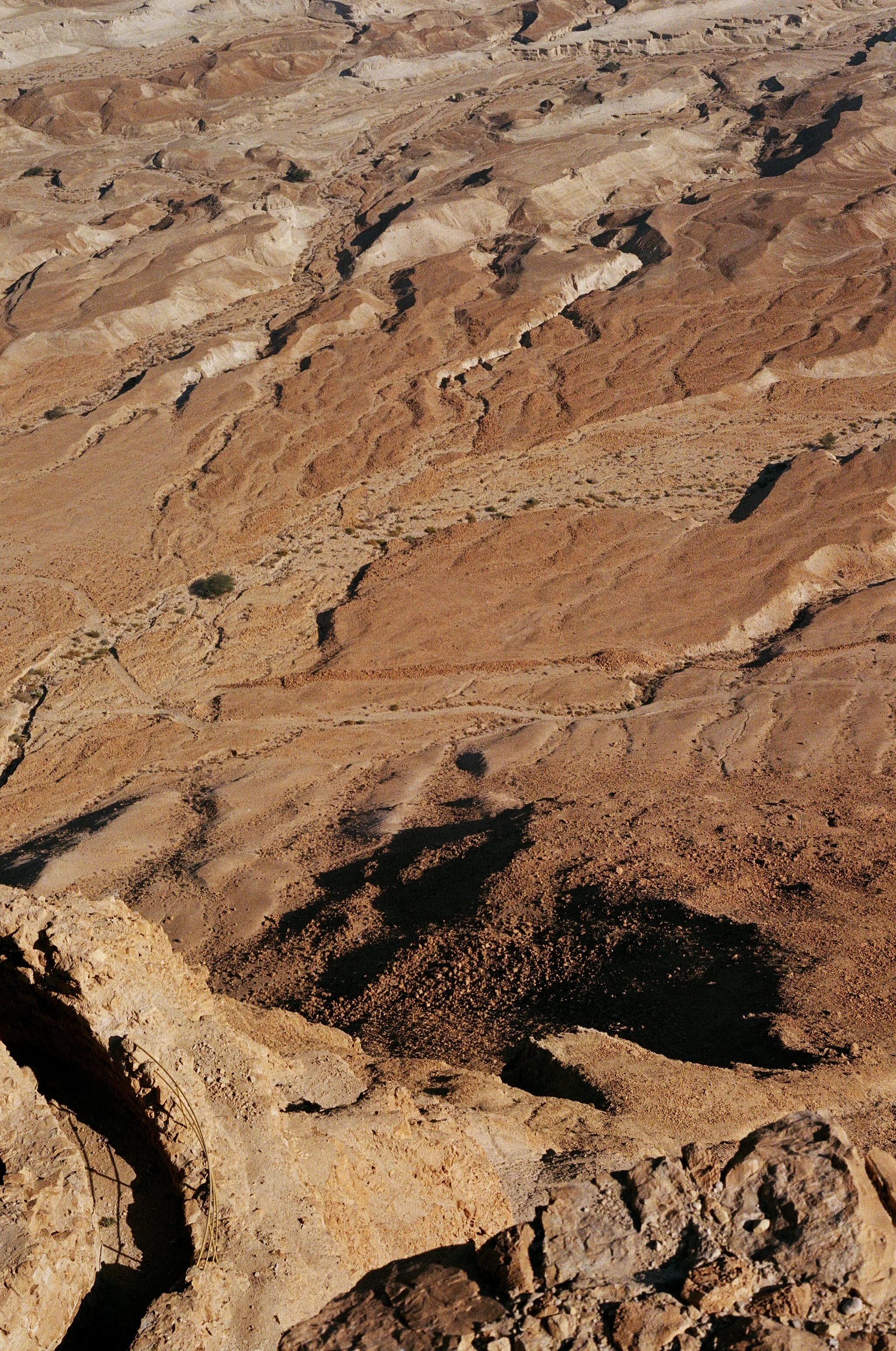 The view from Masada (מצדה metsada "fortress") is an ancient fortification in the Southern District of Israel situated on top of an isolated rock plateau, akin to a mesa.