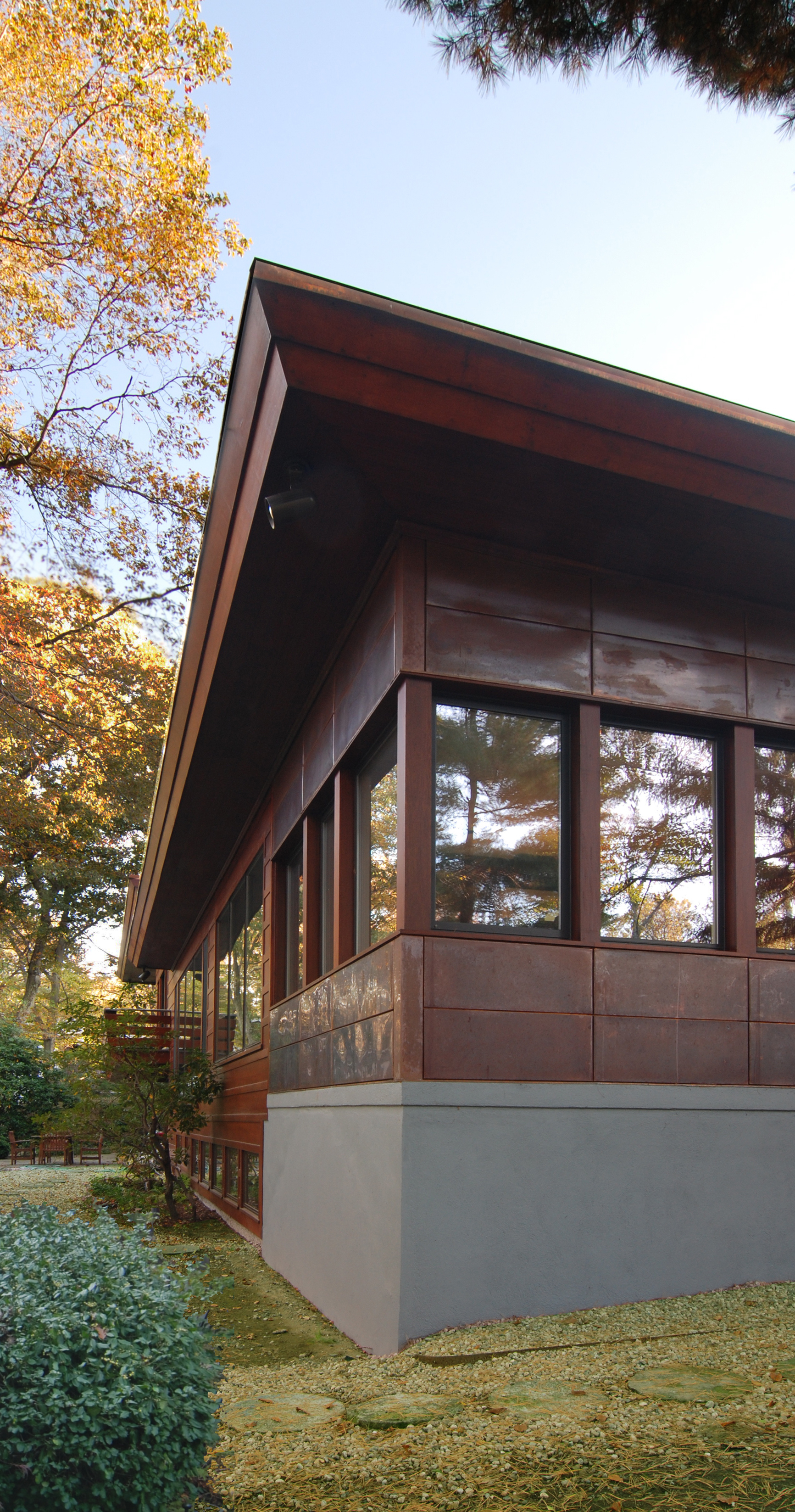  New copper cladding and steel windows made a former porch into a year-round study. 