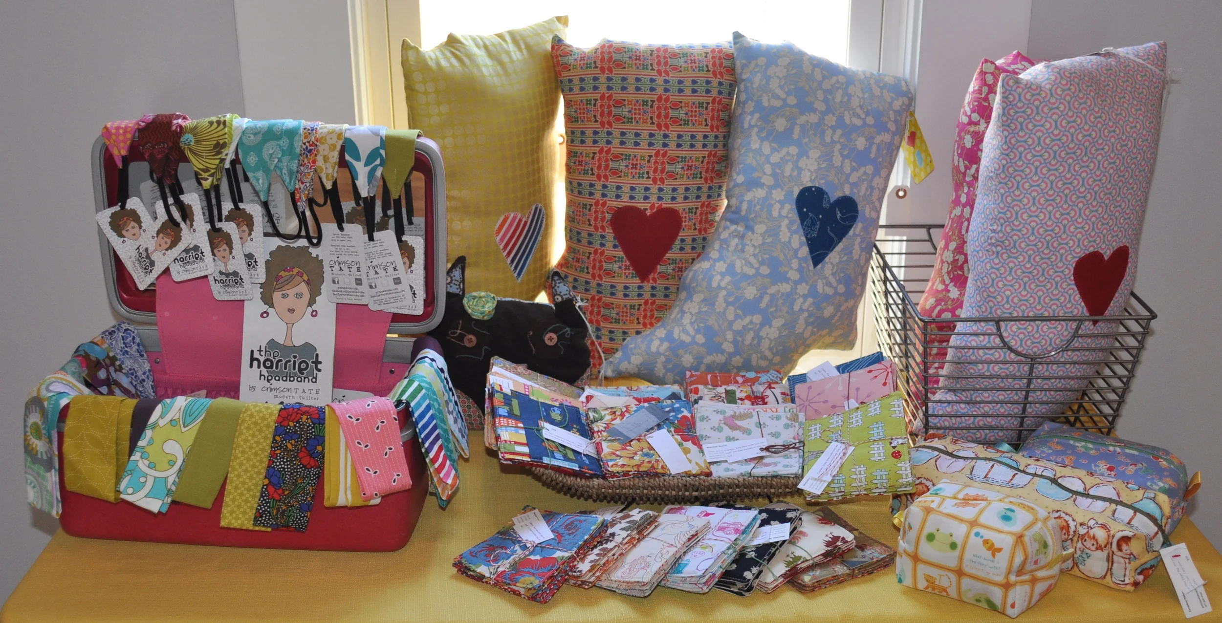   Indiana pillows, The Harriet Headband    Crimson Tate Modern Quilter   crimsontate.com / / heather@crimsontate.com    Coasters, Zipper Bags  Gretchen Fisher GretchenFisher.etsy.com / / gretchenfisher@hotmail.com  