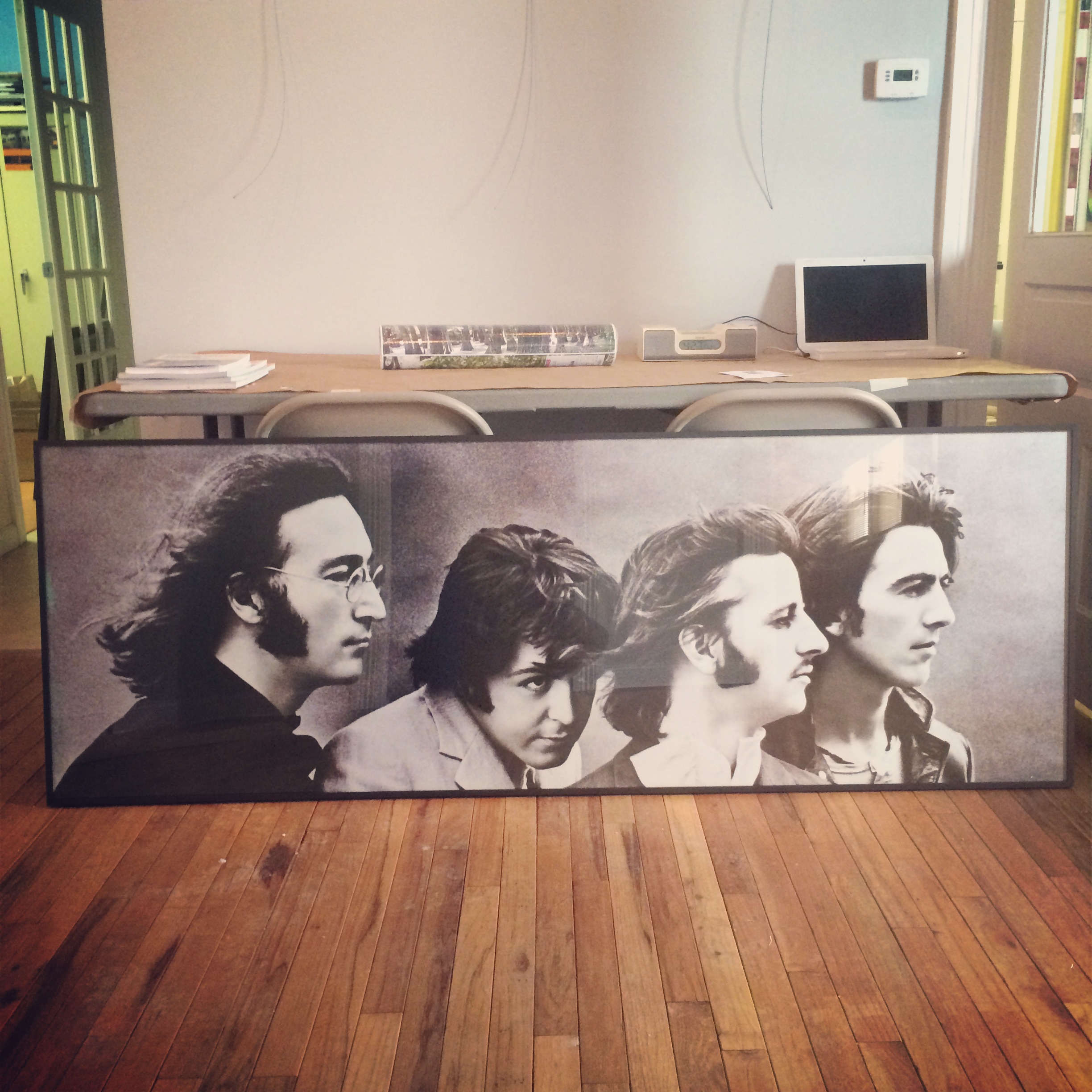  26x74 inch panaramic Beatles poster in aluminum frame. 