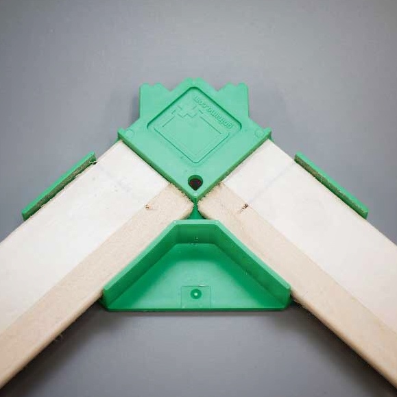 Reusable patented clamps ensure perfectly square frames while keeping the adhesive tape from touching the canvas.