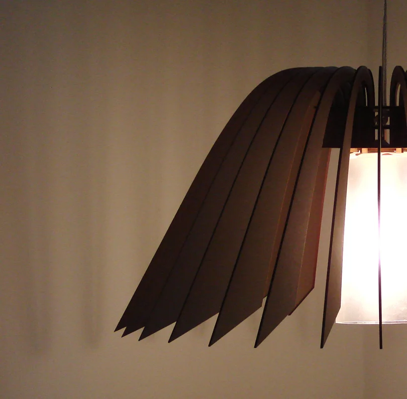  This is one of our early works, long before we were established, just a simple idea of repetative 2D elements that can be assembled to create a flat-pack pendant lamp. 