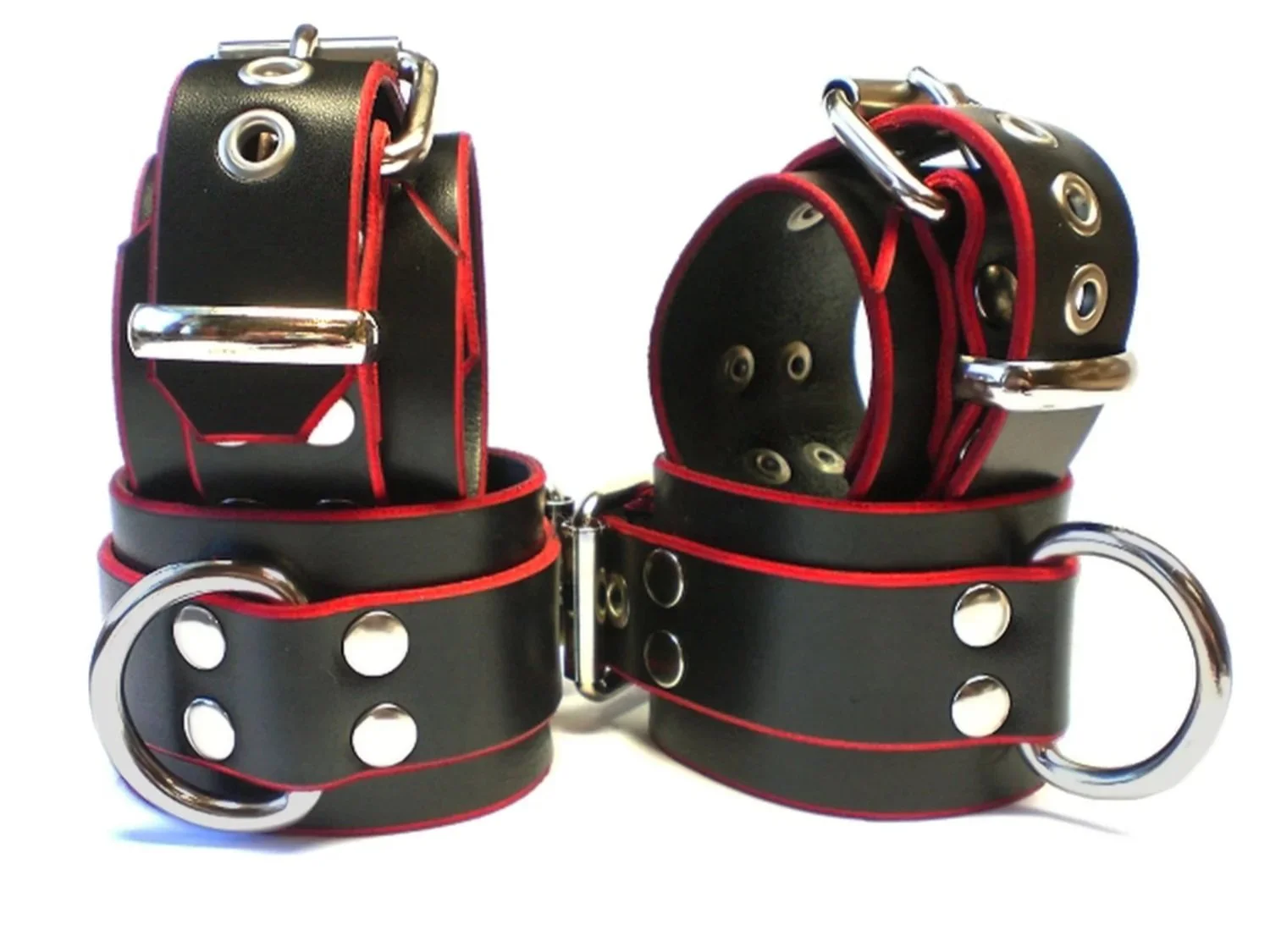 black leather bondage restraints with red edges