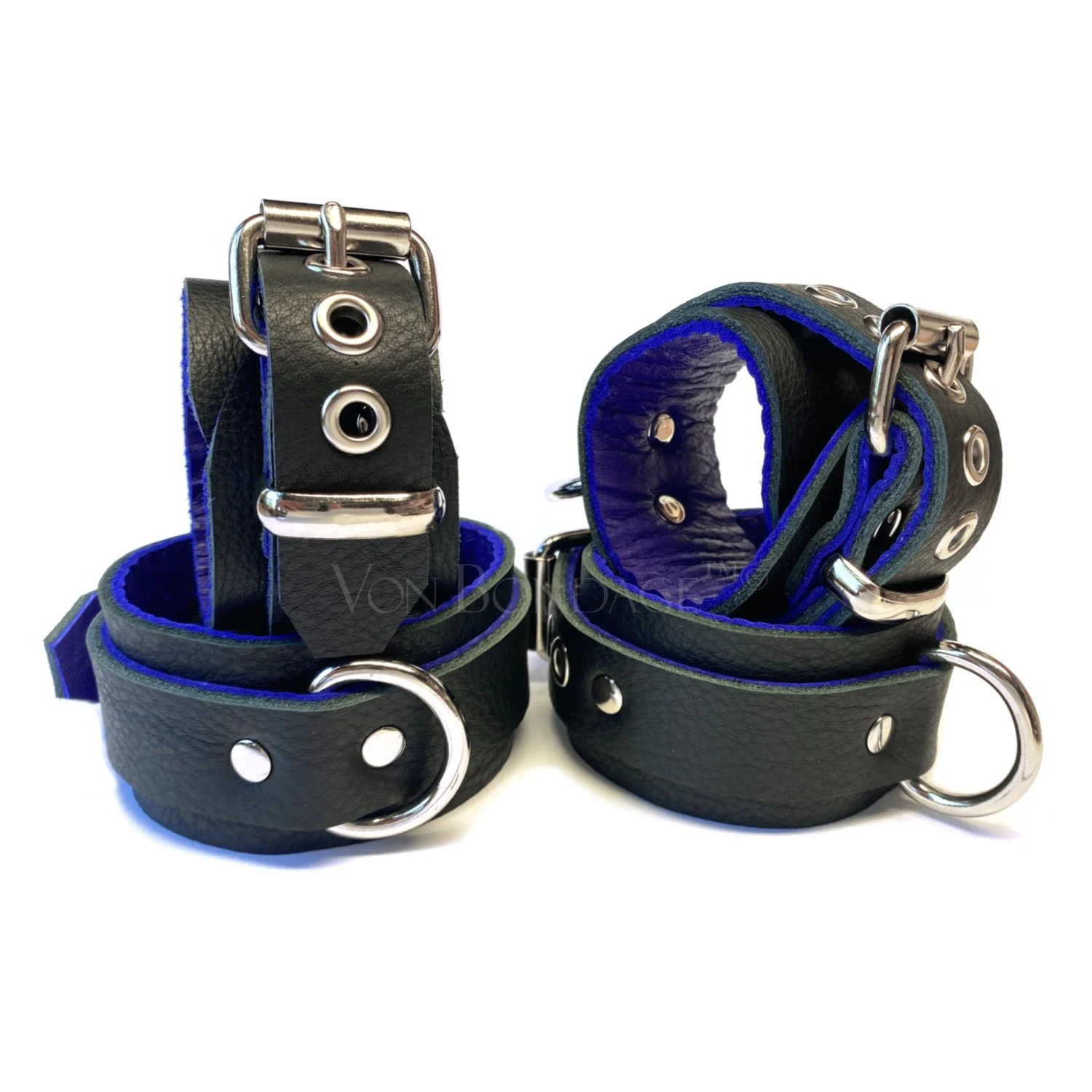 soft black leather bdsm restraints lined in purple leather