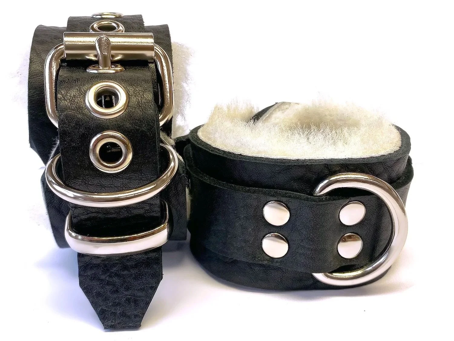 Pair of Black Bullhide Leather Restraints lined in White Sheepskin Fur