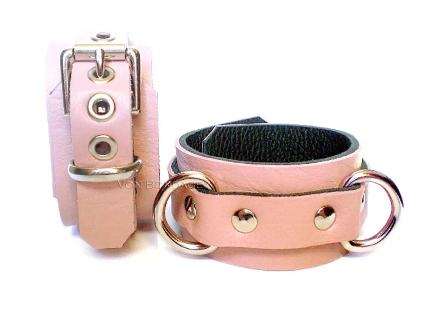 Pair of BDSM Cuffs in Pink Leather with Double D-rings