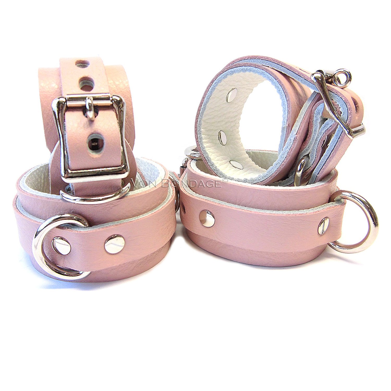 pink and white leather wrist and ankle restraints