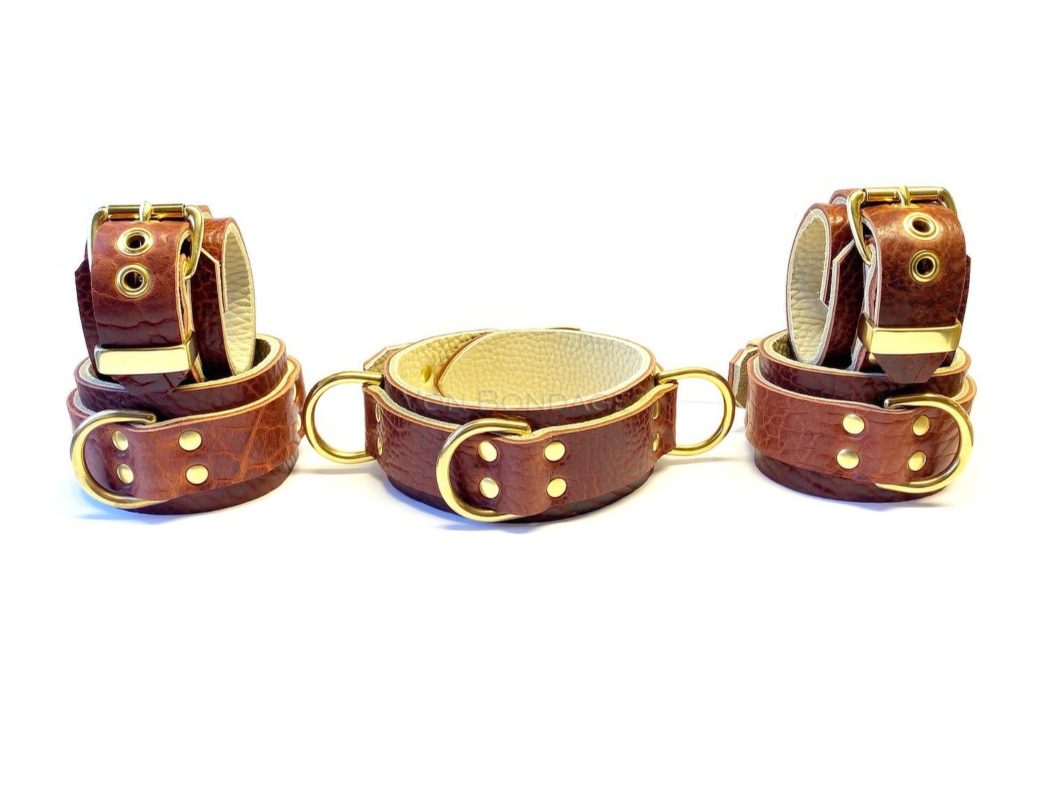 Leather Bondage Restraints & Collar Set in Brass in brown bison leather cream bullhide
