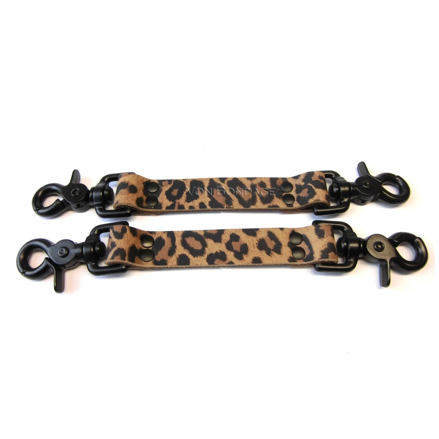 Pair of leopard leather bdsm straps lined in brown leather with black scissor clips