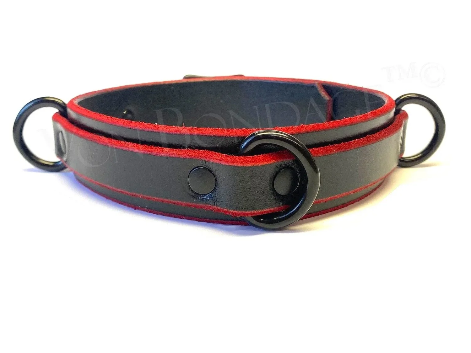 Bondage slave collar in black leather with red edges and 3 black d rings