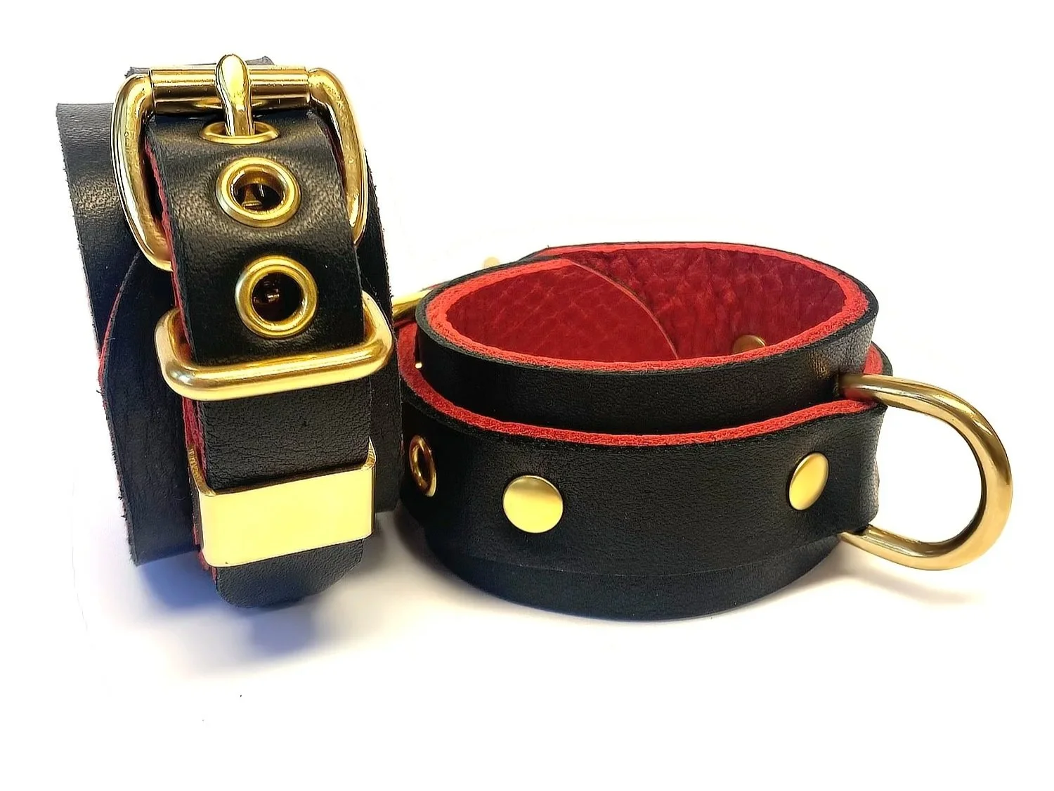 Black & Red Leather restraints with d-rings in brass