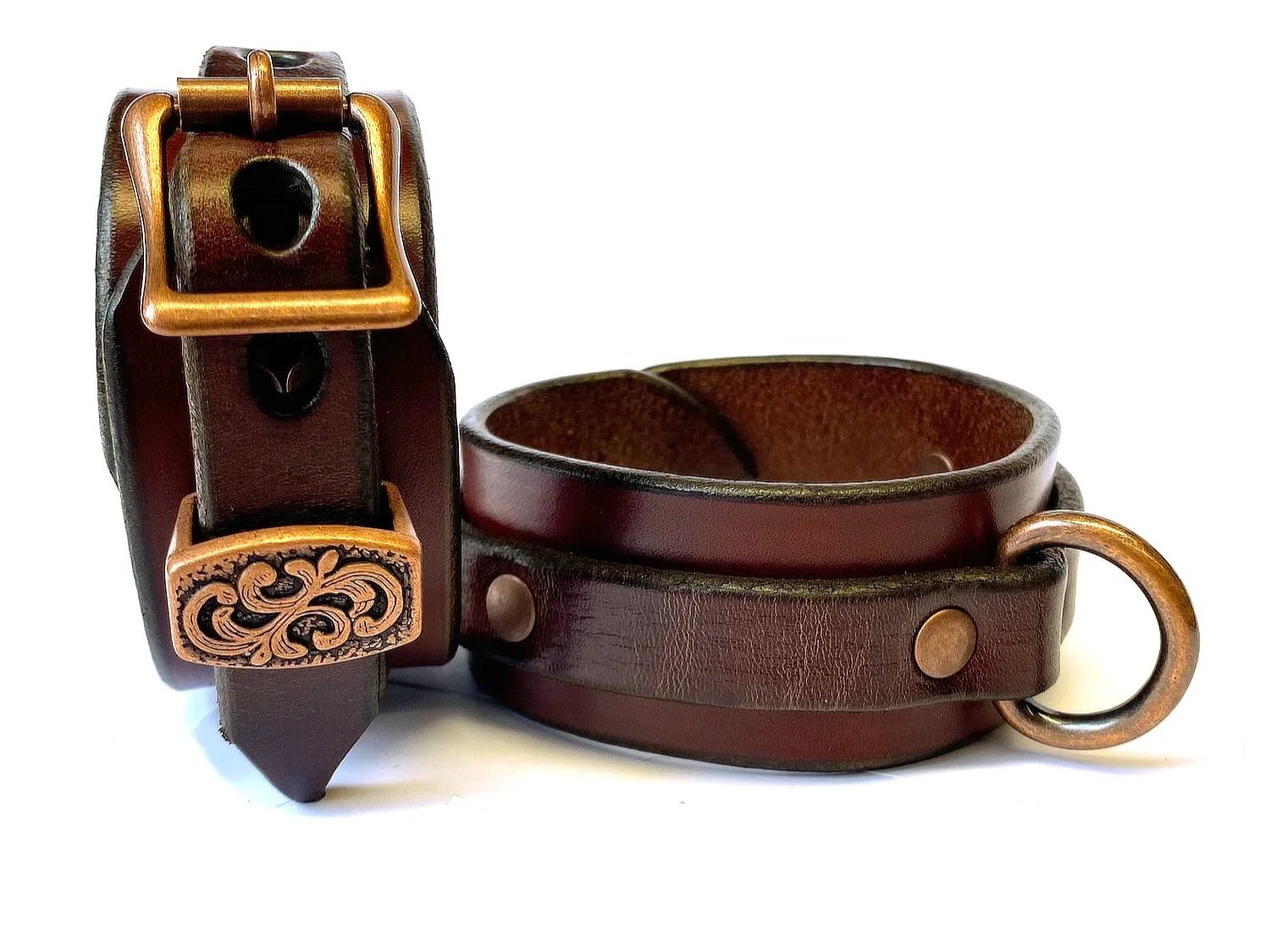 Brown Leather Restraints with Copper D-rings and fancy keepers