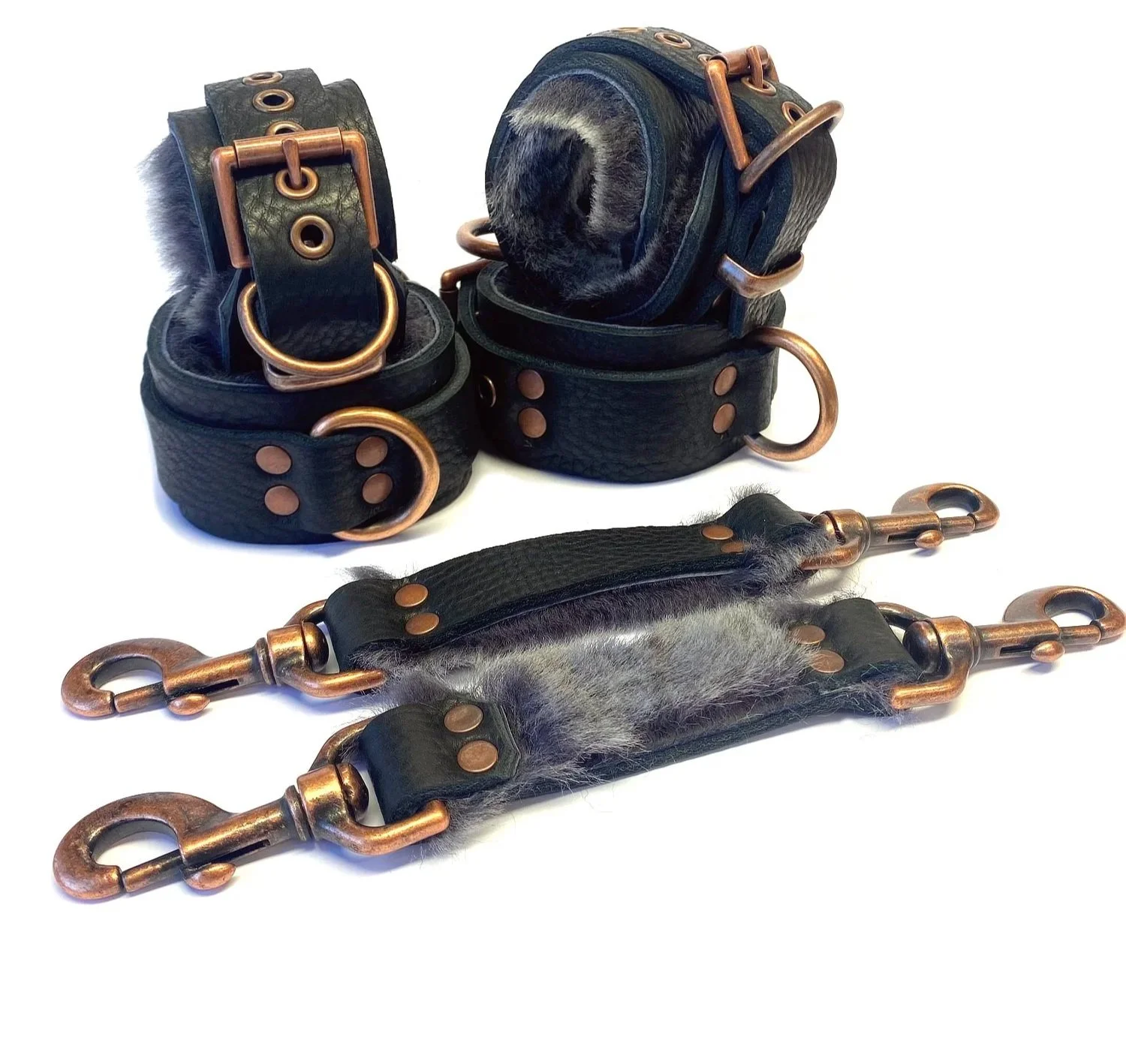 wrist and ankle restraints set lined in gray sheepskin fur with copper d-rings