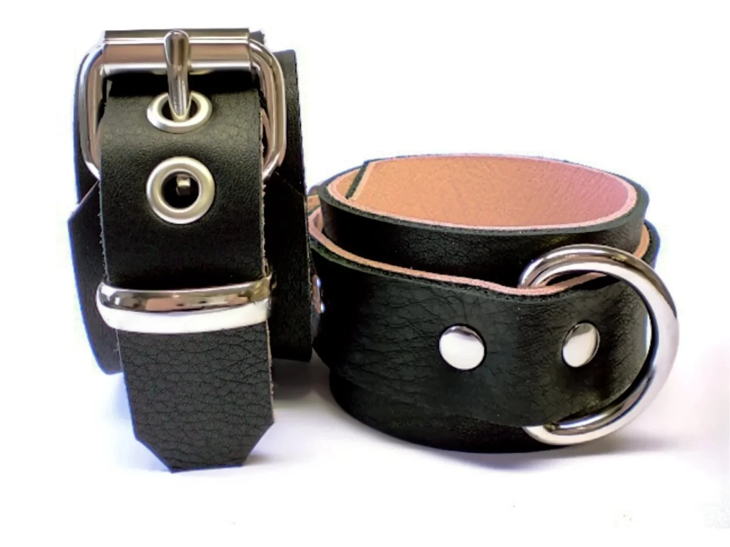 soft black leather bdsm cuffs lined in pink leather