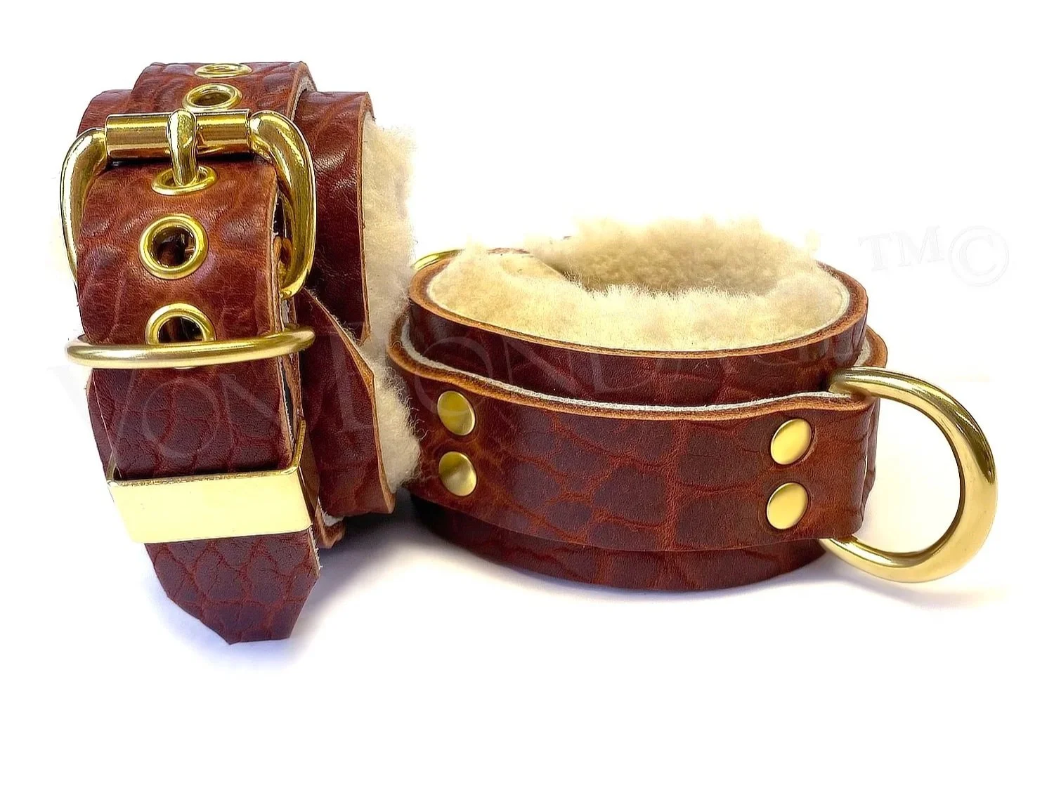 Brown Bison Leather with Cream Sheepskin fur-lined bdsm cuffs with brass d-rings